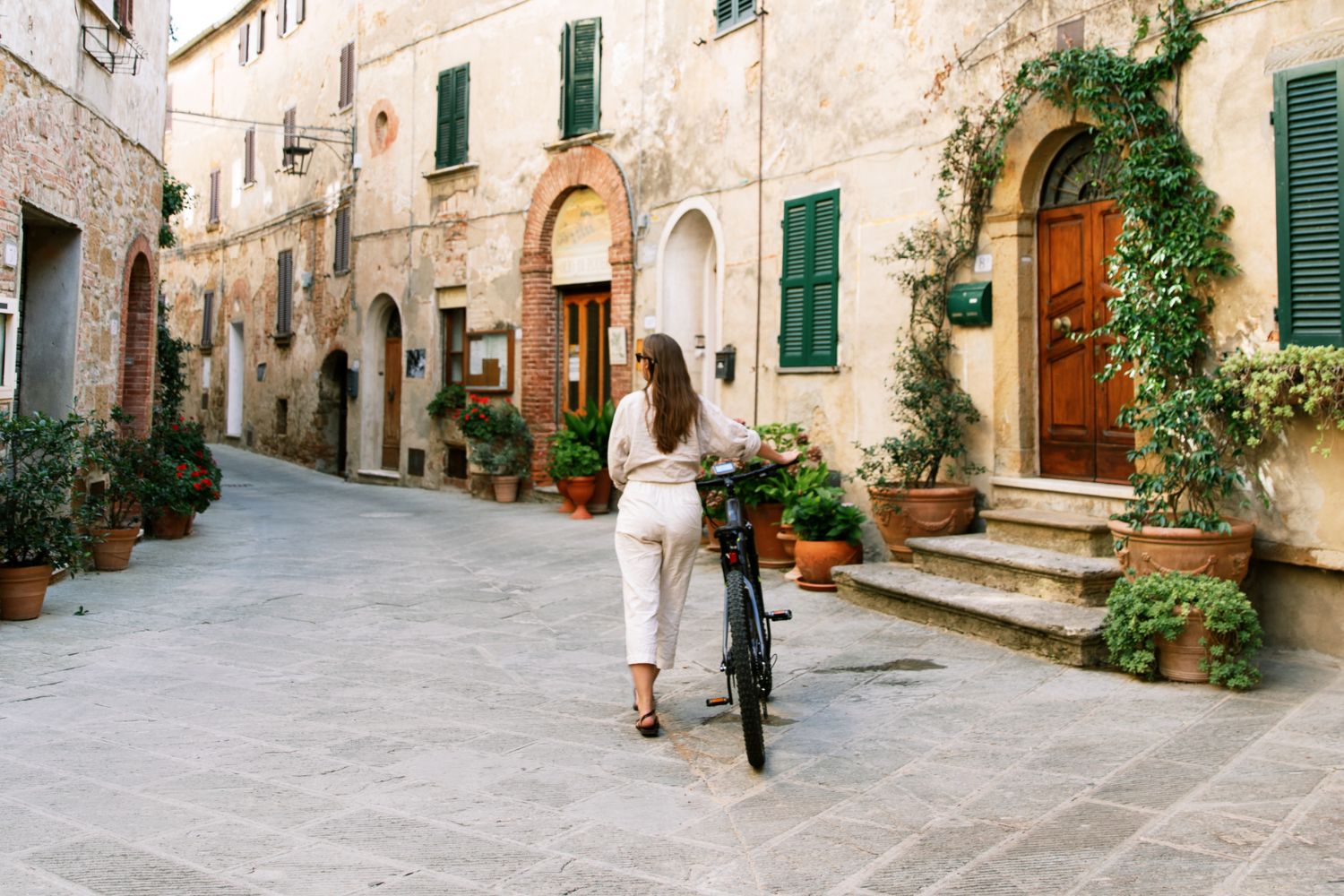 woman biking in europe