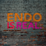 ENDO IS REAL written on a brick wall background