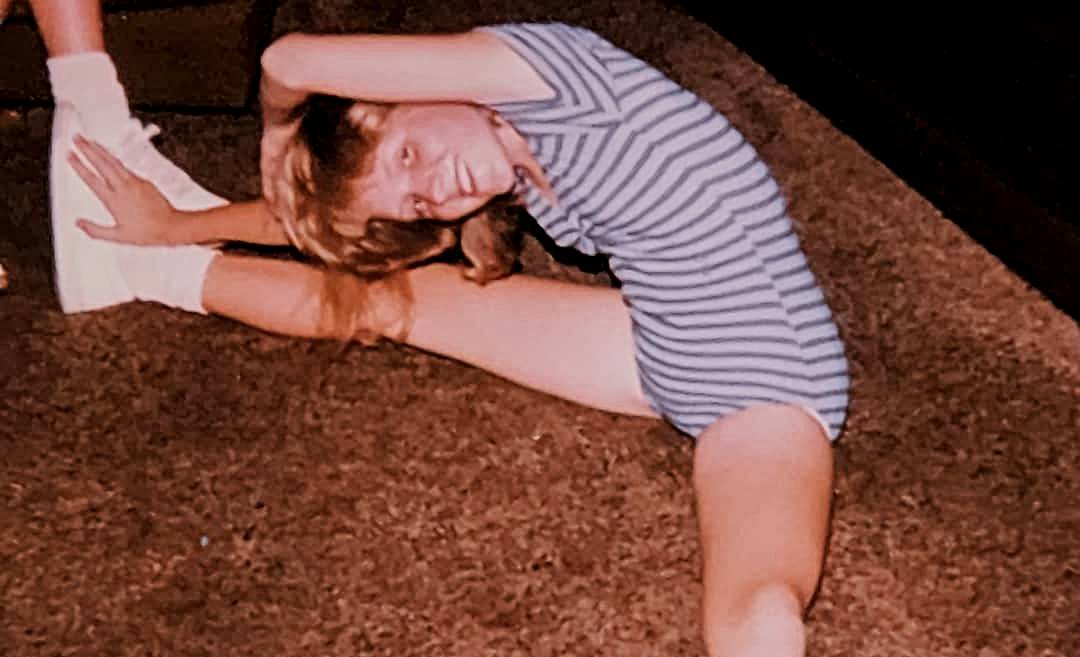 Karyn Johnson as a teenager in 80s workout gear.
