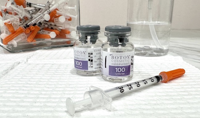Botox bottles and syringe