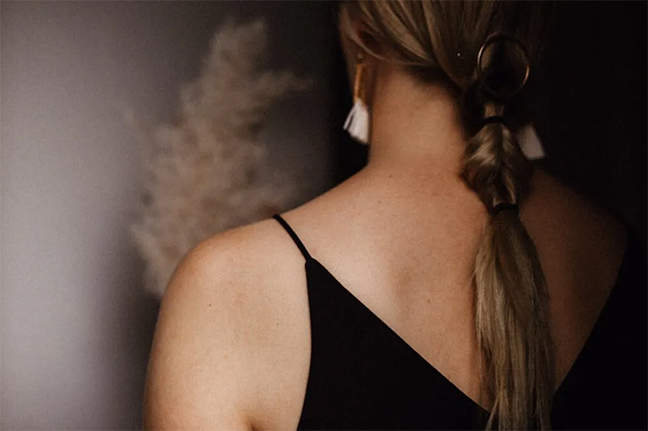 The back of a woman with a braid