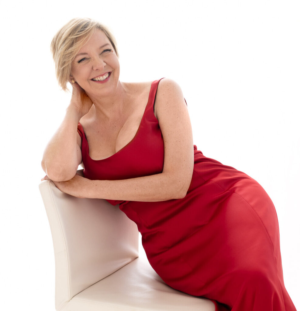 Karen Poirier in red dress
