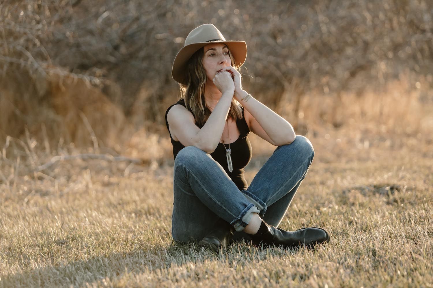 Jen Berlingo sitting in grass