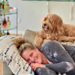 Scary Mommy Founder Jill Smokler on couch with dog