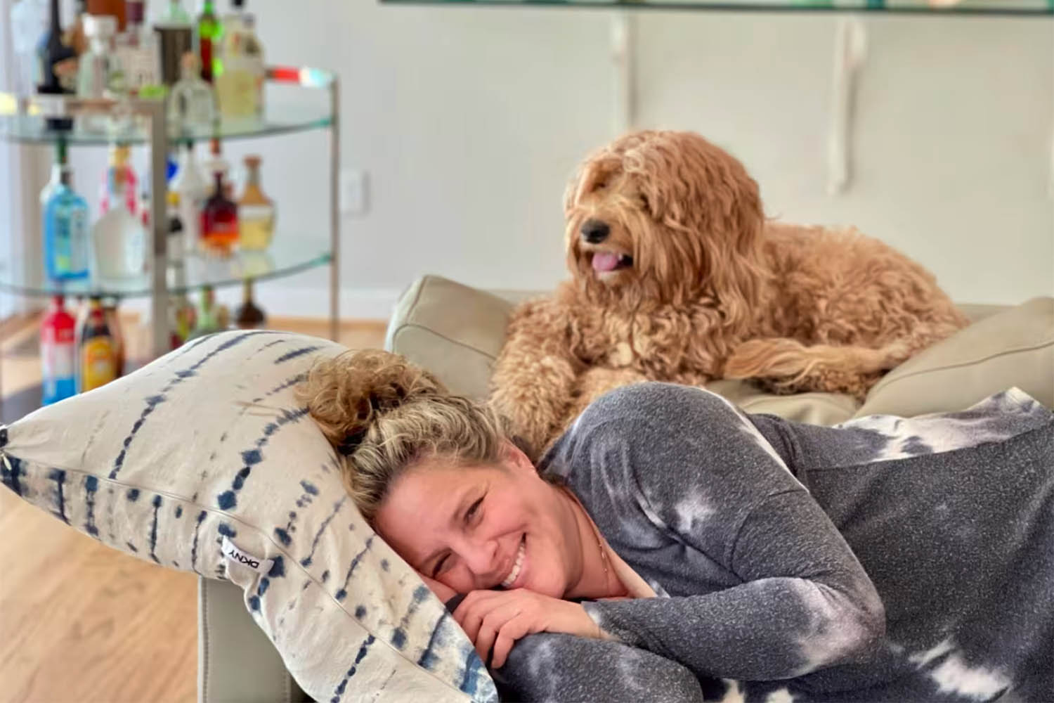 Scary Mommy Founder Jill Smokler on couch with dog