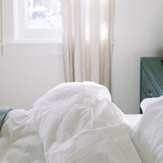 bed with white linens