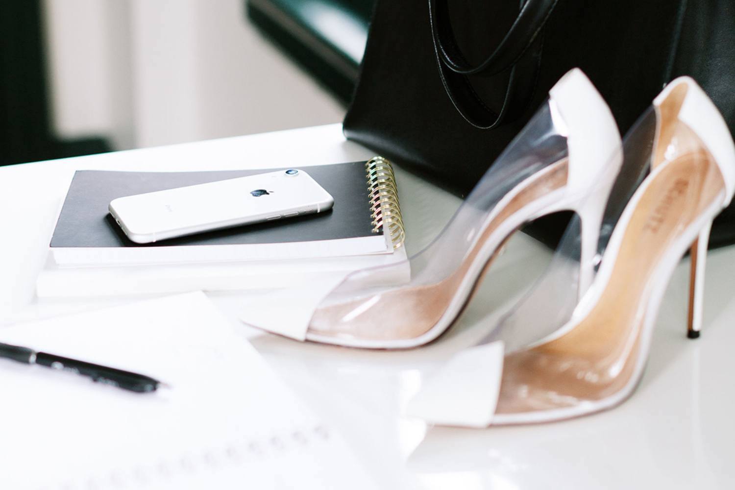 high heels on an office desk