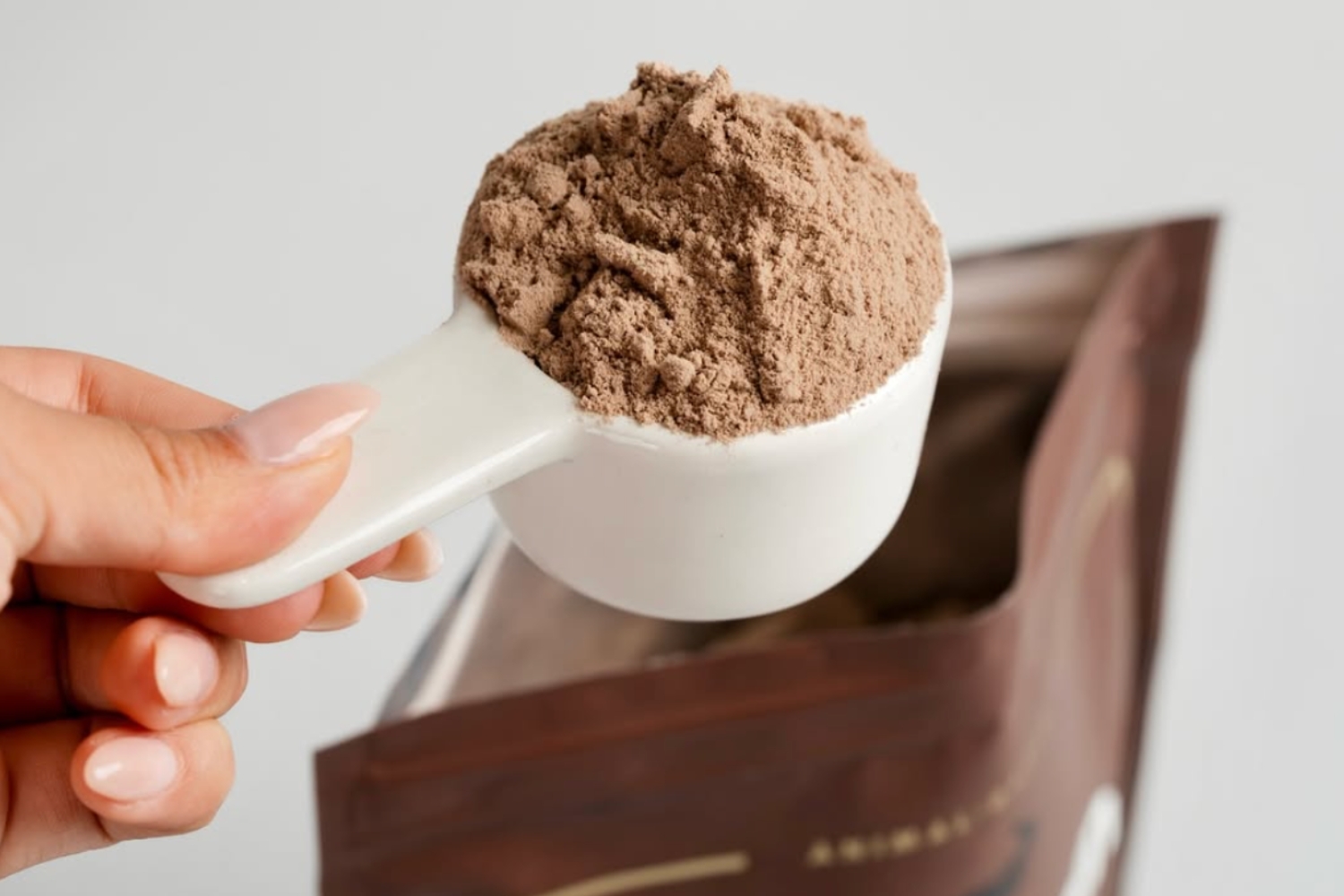 scoop of chocolate protein powder