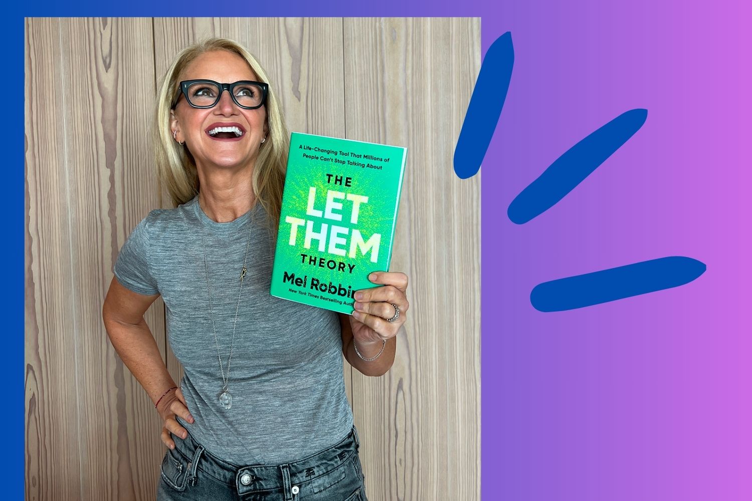 Mel Robbins holding her book, The Let Them Theory