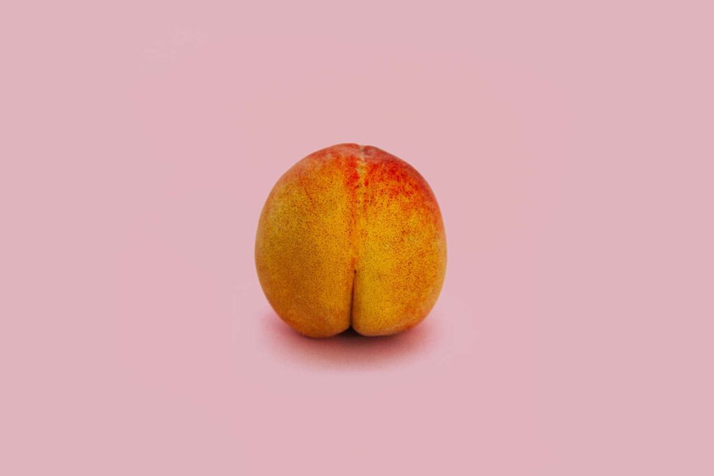 peach on a pink background