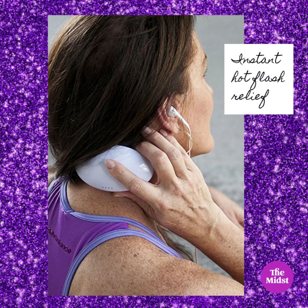 A woman using a Menopod on her neck to cool down her hot flash