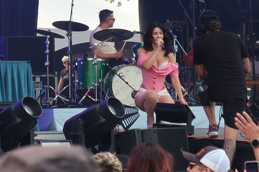 Marina performing live in 2025