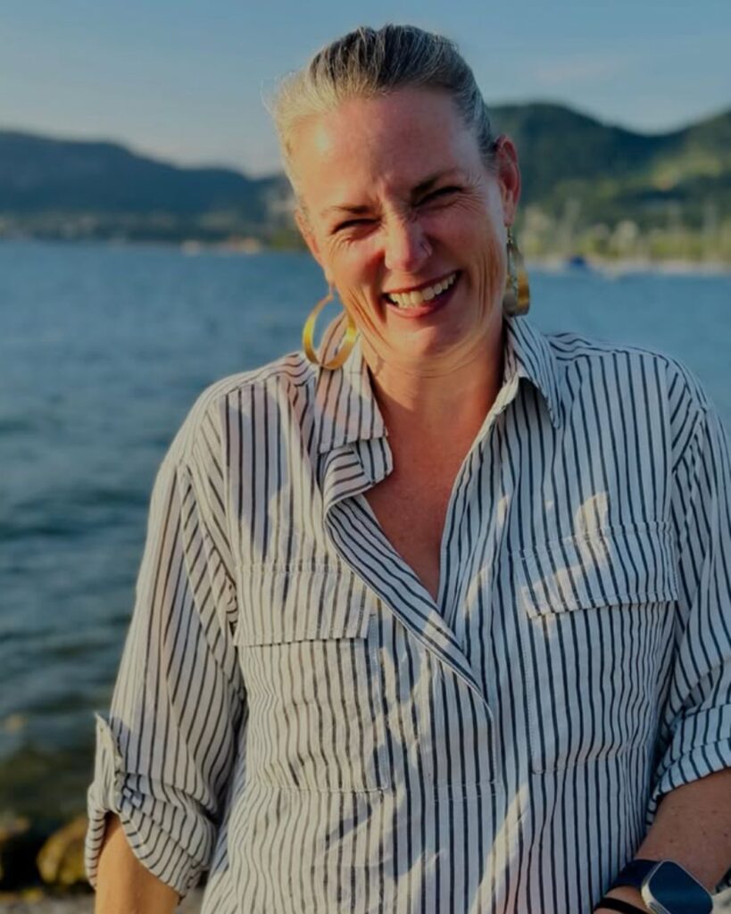 Menopause coach Sara Larson at a lake