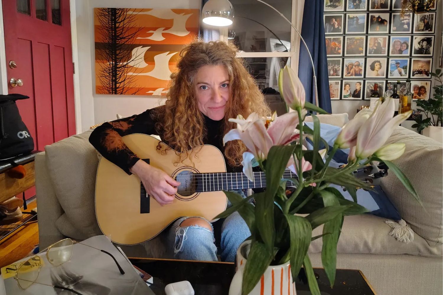 Amie Newman playing guitar